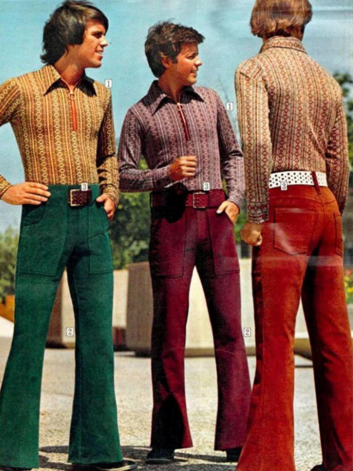 Three men wearing patterned shirts with deep V-necks and flared trousers in retro colors.